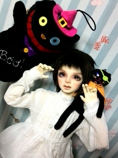 ���߂���