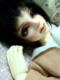 ���߂���